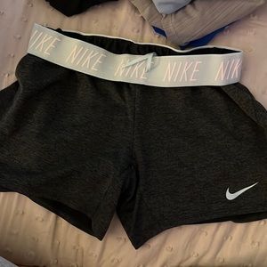 grey nike shorts with light blue waistband
